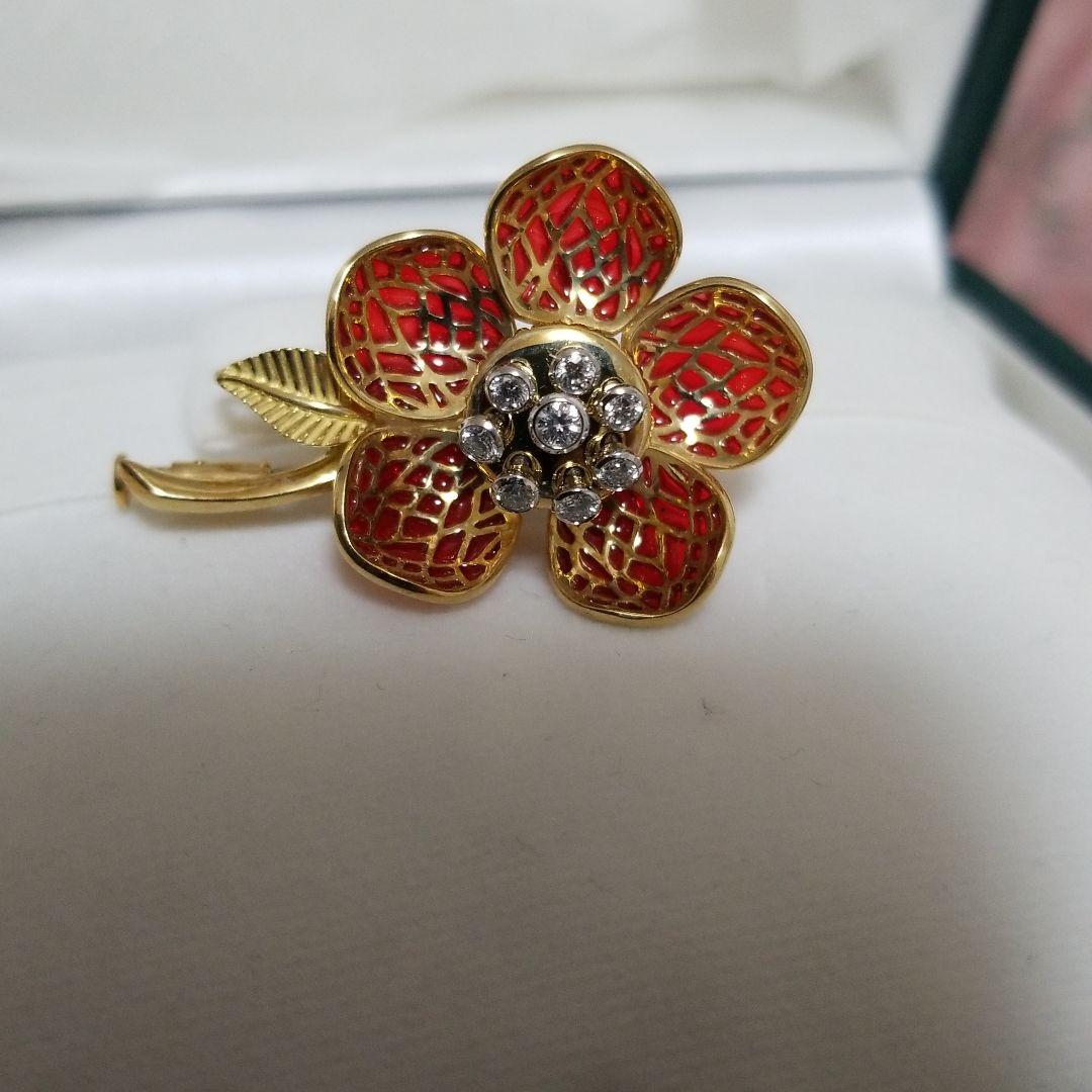 平和堂貿易　動く　ブローチ　刻印　あり　金　750　PT950　0、28カラット