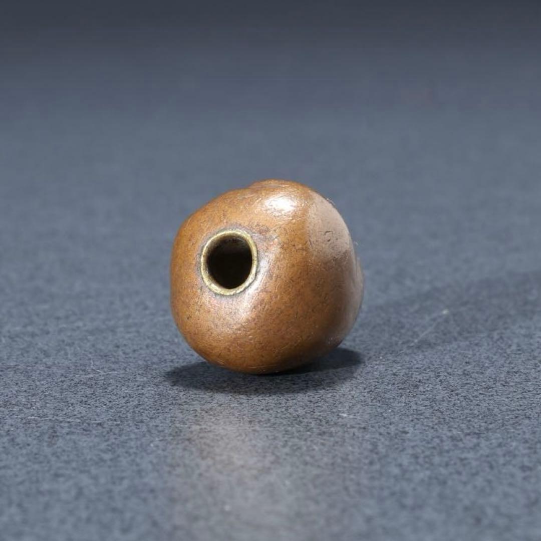 緒締め玉　達磨　提げもの　金属　茶色　金工　R1641