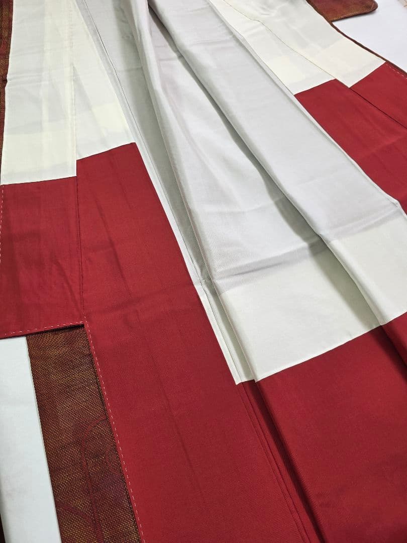 【七代目 都喜ヱ門】【手絣】未使用品 藤絹織物 大島紬 一元式 証紙 躾付き