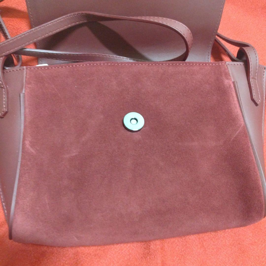 【ロンシャン 】ペネロペ　ショルダーバッグ タッセル付きえんじ色