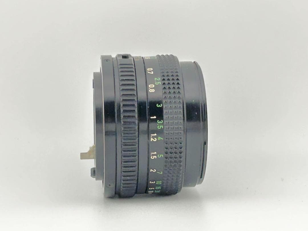 【完動品】　Canon A-1　FD 50mm 1:2 モルト貼替・動作確認済