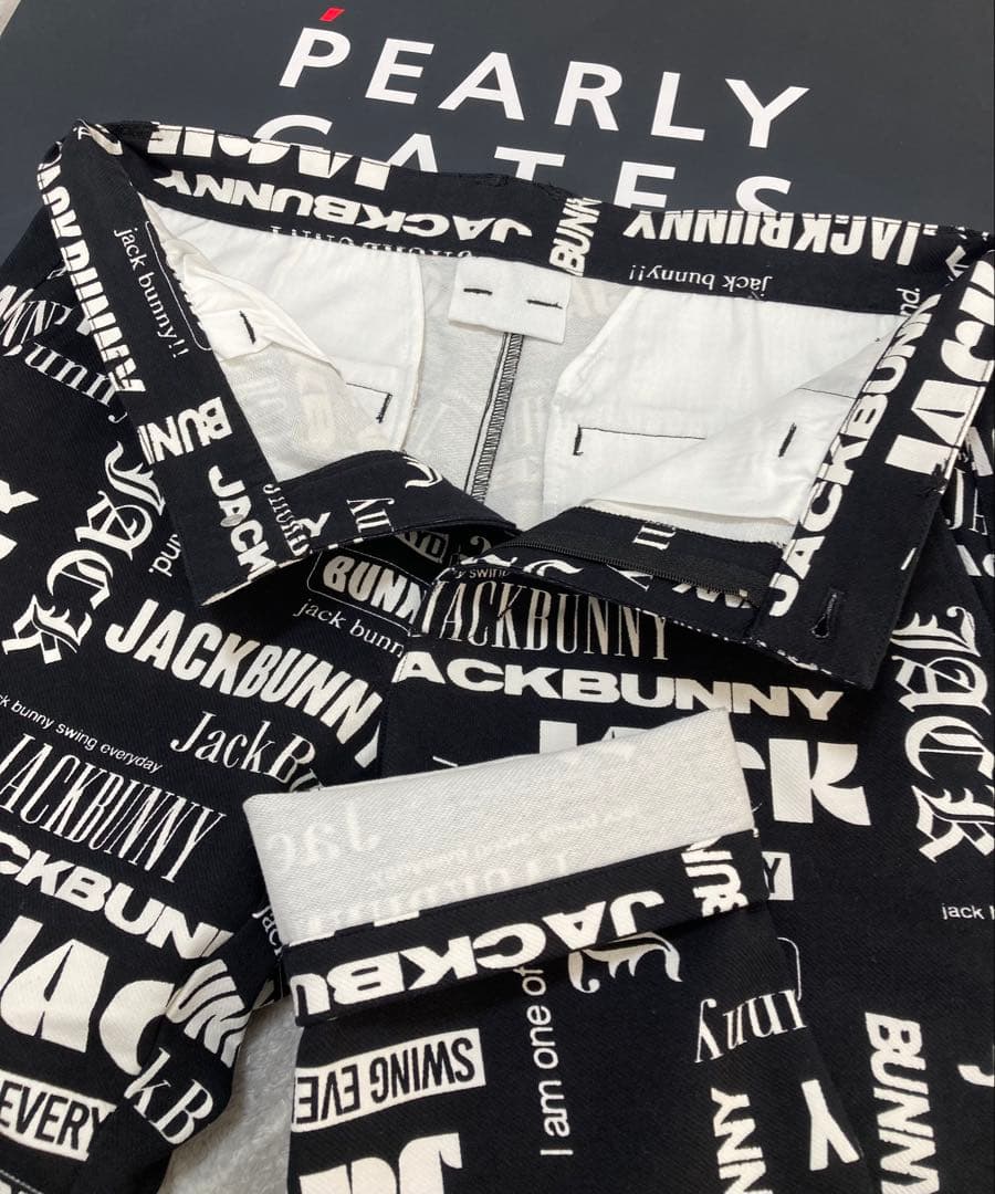 新品 パーリーゲイツ ジャックバニー ツイル 総柄テーパードパンツ(4)M/黒