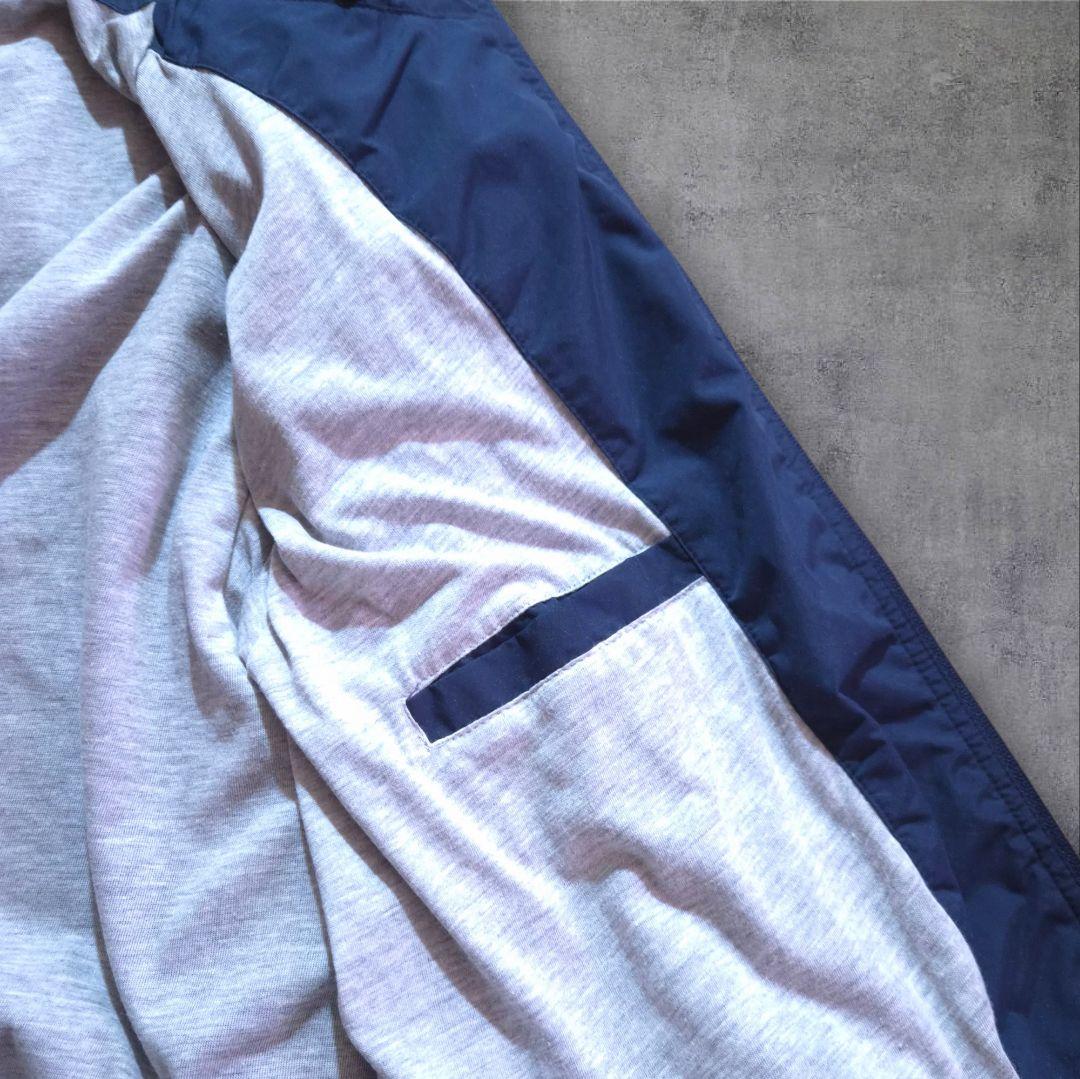 90s Reebokリーボックナイロンジャケット 刺繍ロゴ万国旗タグビッグサイズ