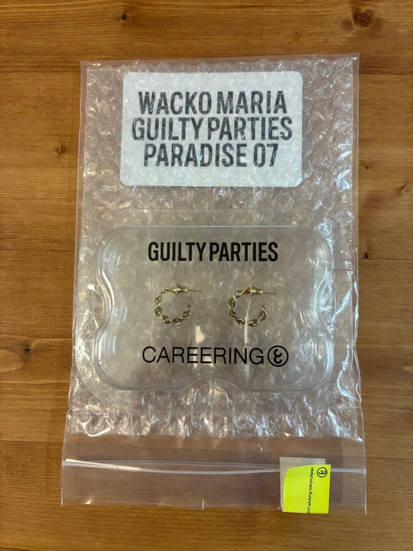 CAREERING GUILTY PARTIES ツイストデザインピアス