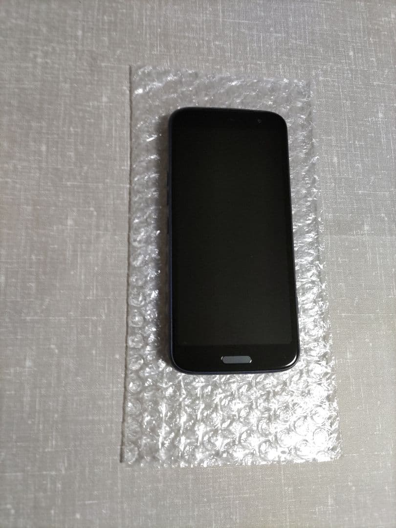 新品同様 らくらくスマートフォン F-53E ネイビー 新品ケース、フィルム付き