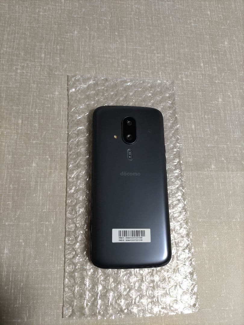 新品同様 らくらくスマートフォン F-53E ネイビー 新品ケース、フィルム付き