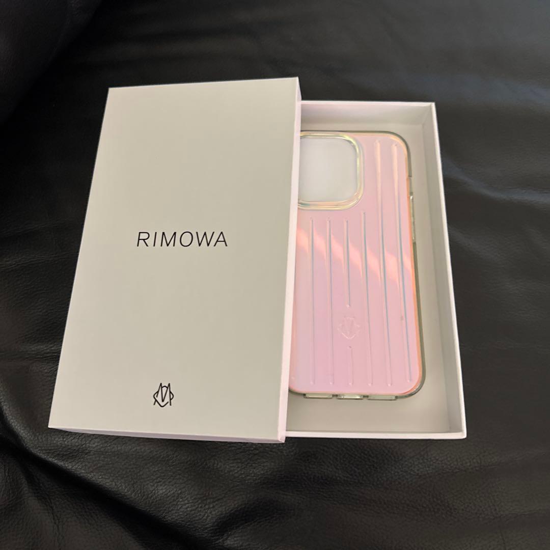 リモワiPhone14 Proポリカーボネート 虹色 ケース中古品
