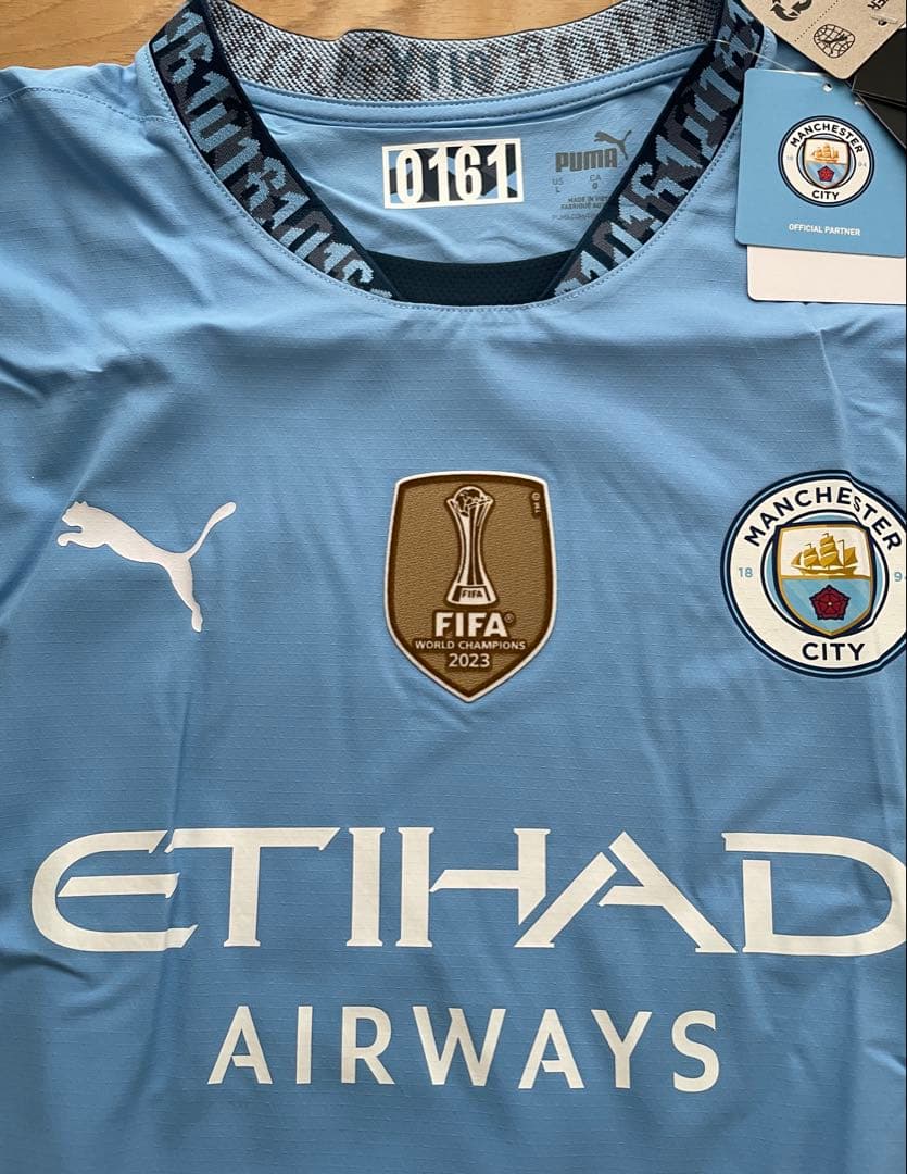 【未使用美品】マンシティ2023-24四連覇優勝記念ウェア　シリアル番号161