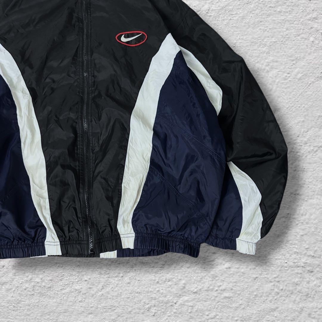 nikeナイキナイロンジャケット90sビッグロゴvintage古着ブラック刺繍L