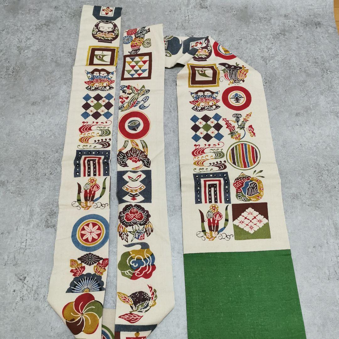 【紬】見ていて楽しい！意味ありげ型染め 名古屋帯 お正月