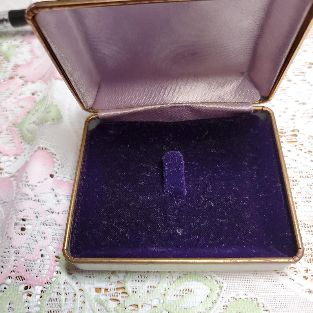 Carven 金色の花束ブローチ