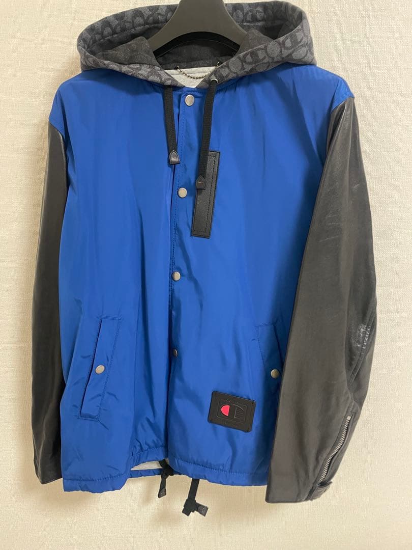coach × Champion フーディージャケット