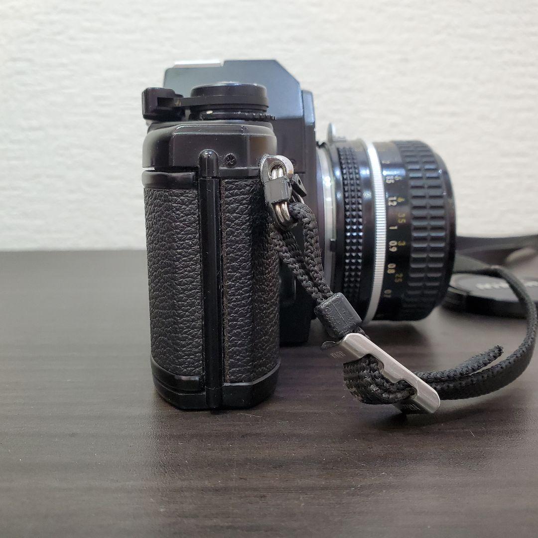 Nikon EM + NIKKOR 50mm F1.8 Ai ストラップ付
