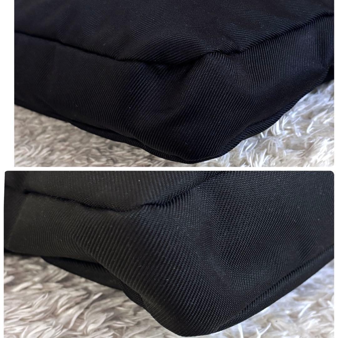 新品同様✨コーチ ショルダーバッグ ブラック ターンロック チャーム 男女兼用