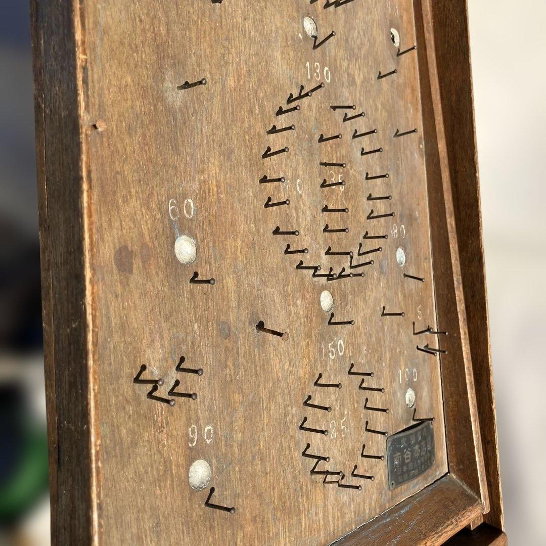 (437)昭和時代のビンテージ品木製玩具で、コリントゲームと呼ばれるものです。