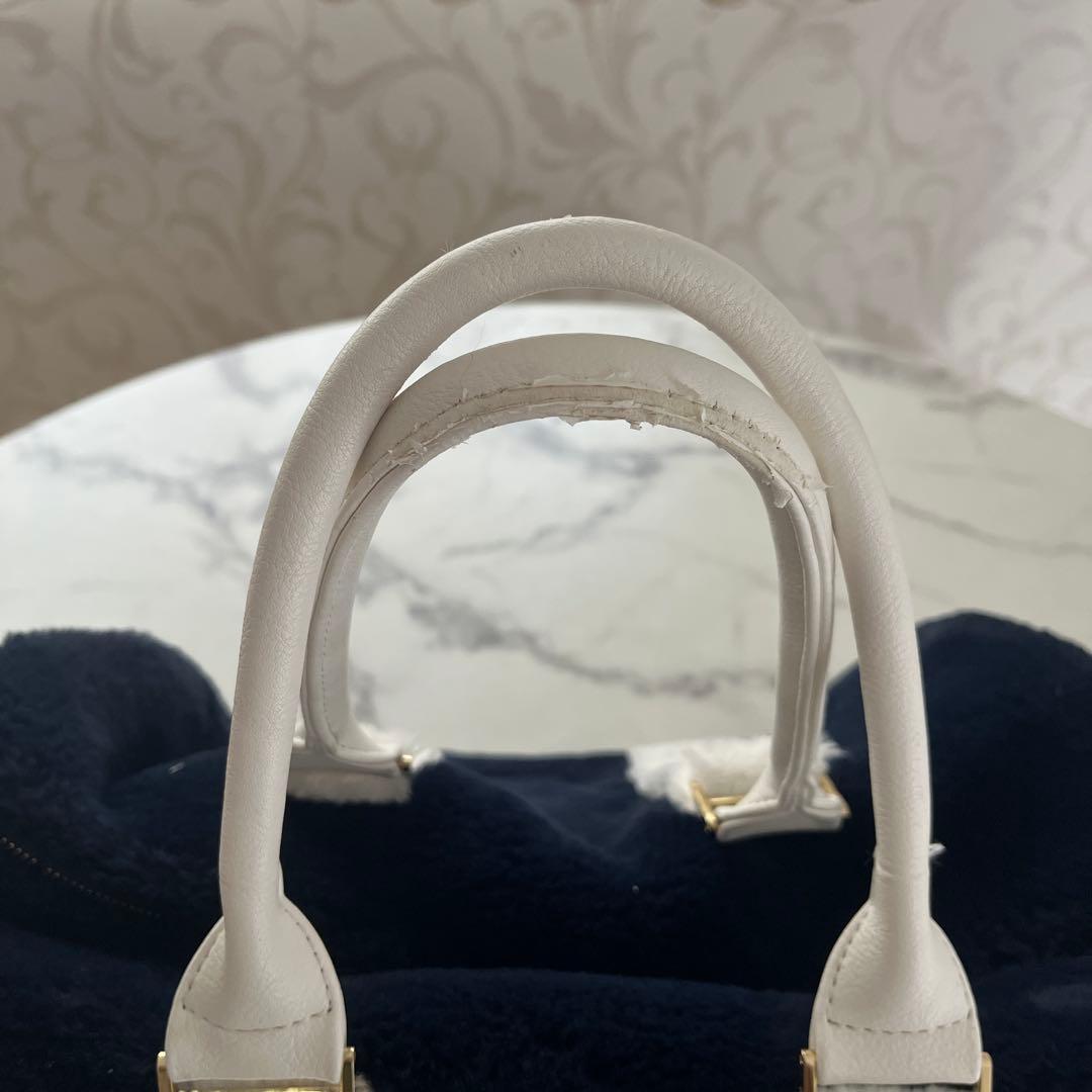 ムータ 配色ファーボストンバック