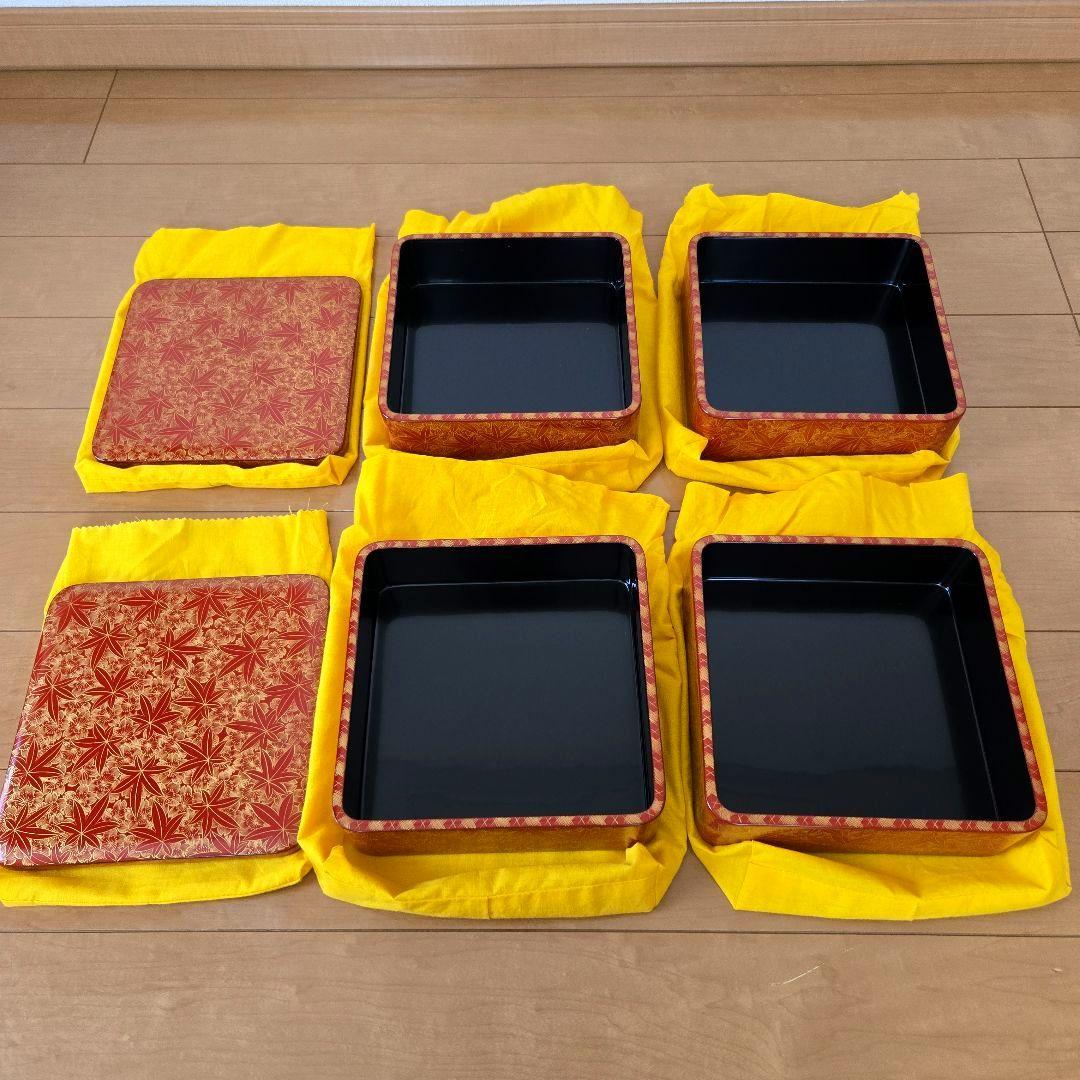 【未使用】輪島塗 四段重 雲錦彫り 詰め網代 沈金 台付き 二枚蓋