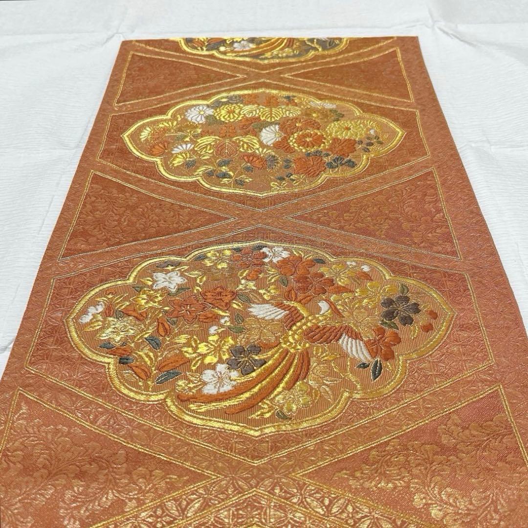 梅垣織物　袋帯　西陣織　七宝菱蒔絵文　正絹　金糸　オレンジゴールド系　逸品