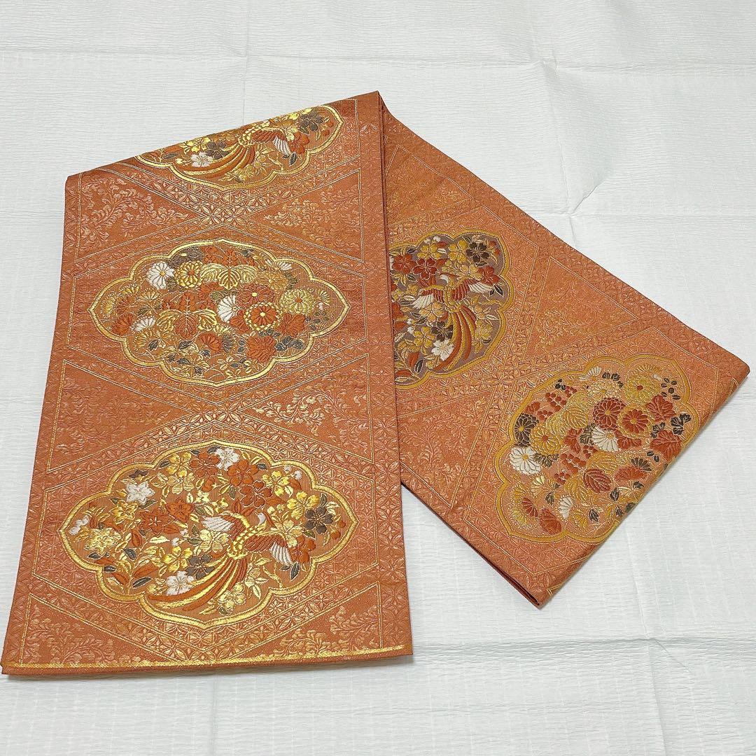 梅垣織物　袋帯　西陣織　七宝菱蒔絵文　正絹　金糸　オレンジゴールド系　逸品