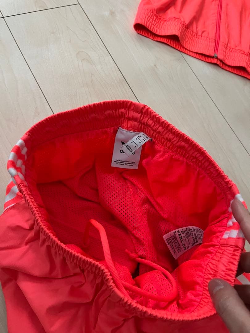 アディダス　サーモンピンク　ロックアップ　ウーブントラック　トレフォイルMサイズ