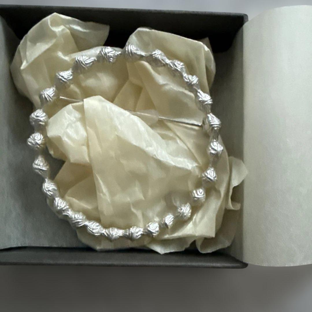 ミナペルホネン　タンバリン　ブローチ