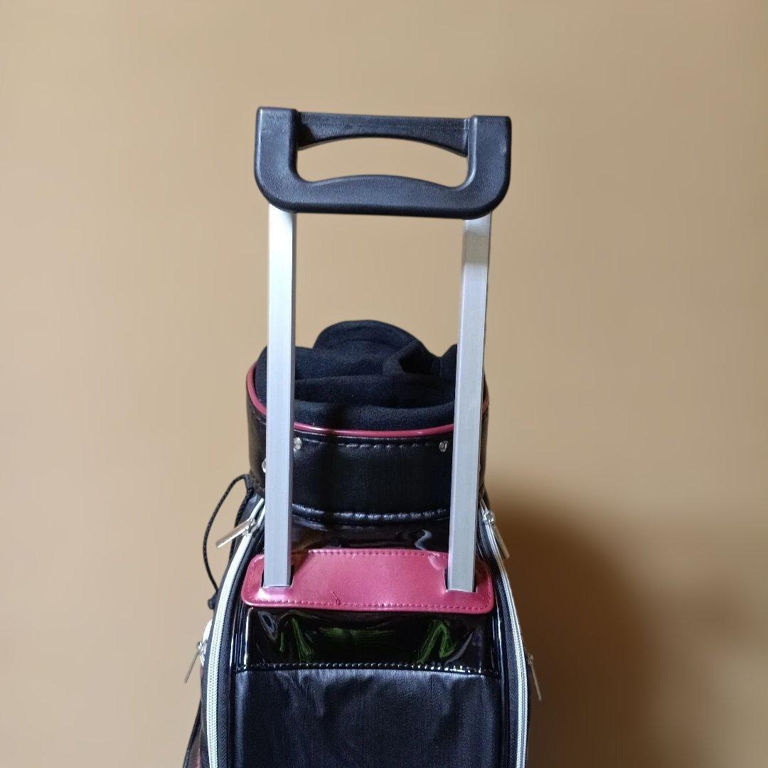 美品 TIGORA キャディバッグ キャスター付き 黒/赤フード未使用