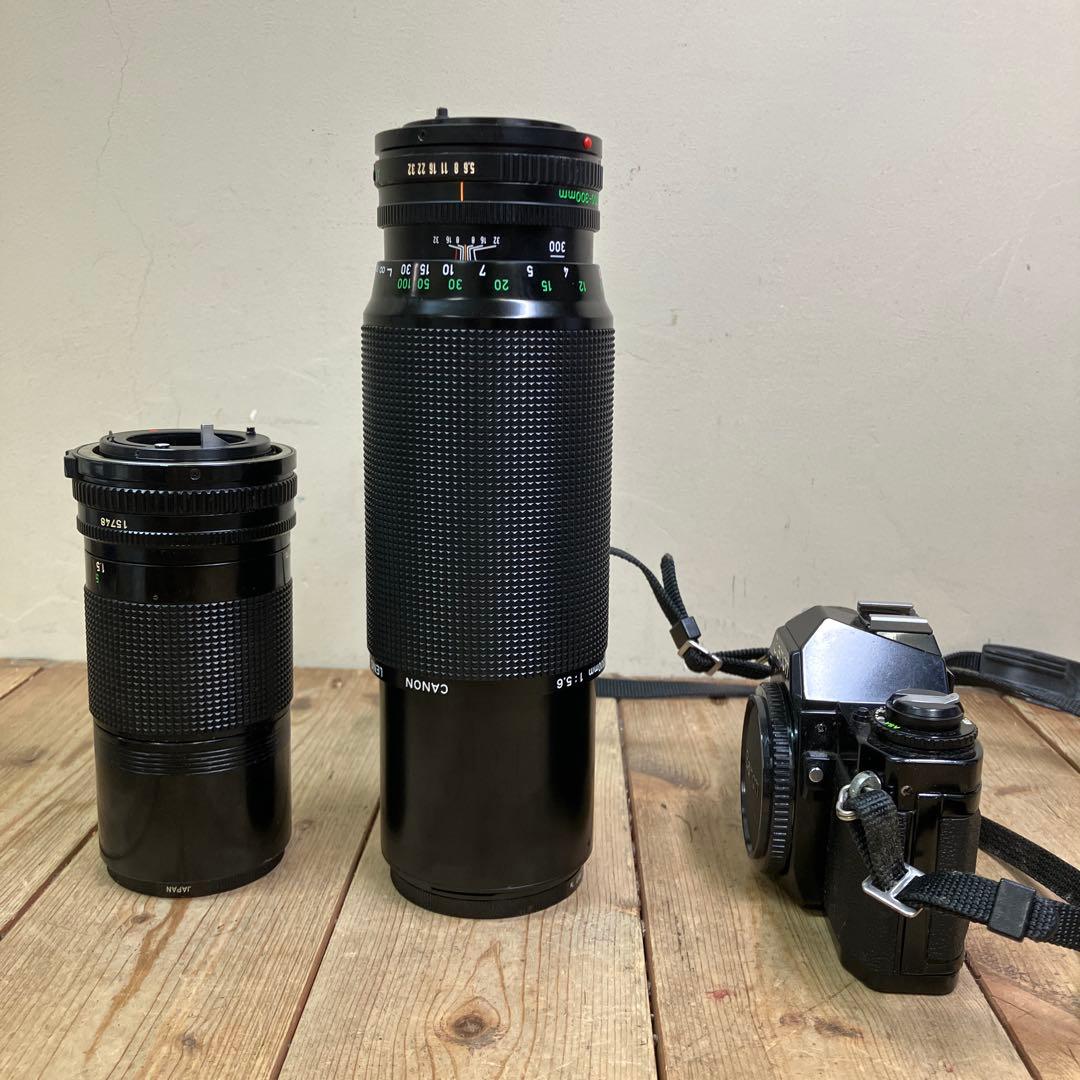 A-壁 Canon AV-1 フィルムカメラ レンズ2本セット アルミケース付