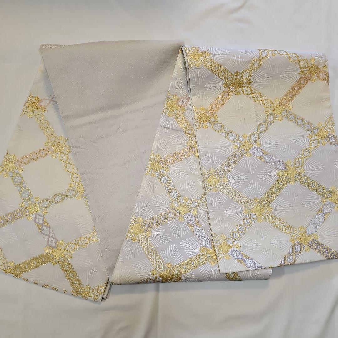 袋帯☆つづれ唐織☆正絹☆加賀の宴☆六通☆フォーマル☆白地☆七宝柄☆仕立て上がり