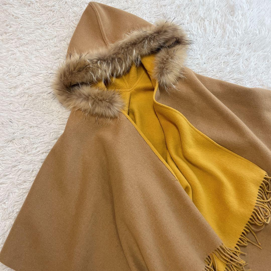 美品 グレースコンチネンタル ダイアグラム ポンチョ ラクーンファー フード