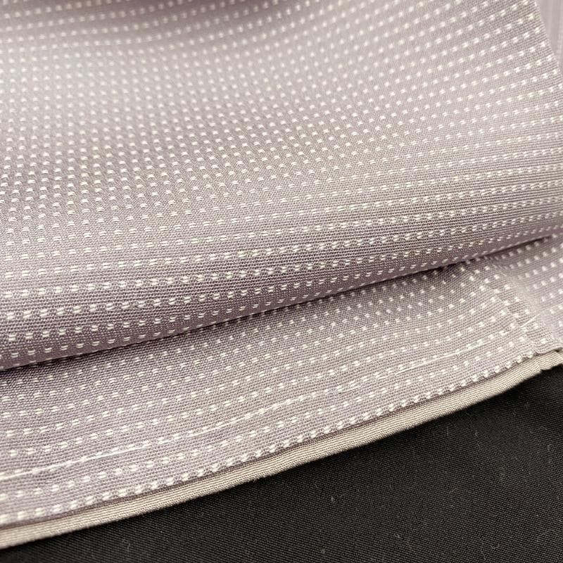 601mt70●御召 紋織 淡いラベンダー色 角通し柄 パールトーン●しつけ付