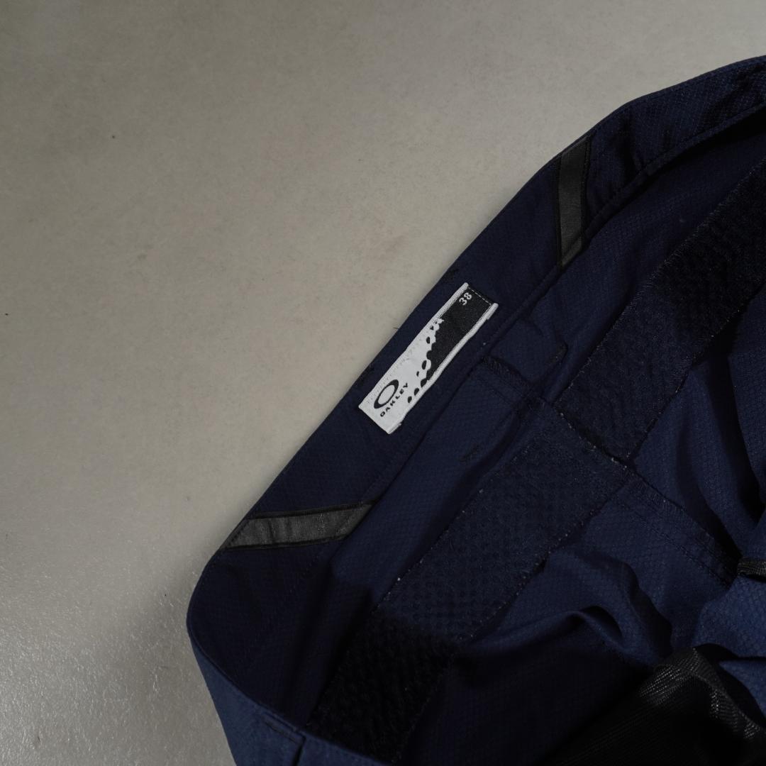 OAKLEY 18SS ゴルフパンツ カーブ テック ネイビー/EZ111