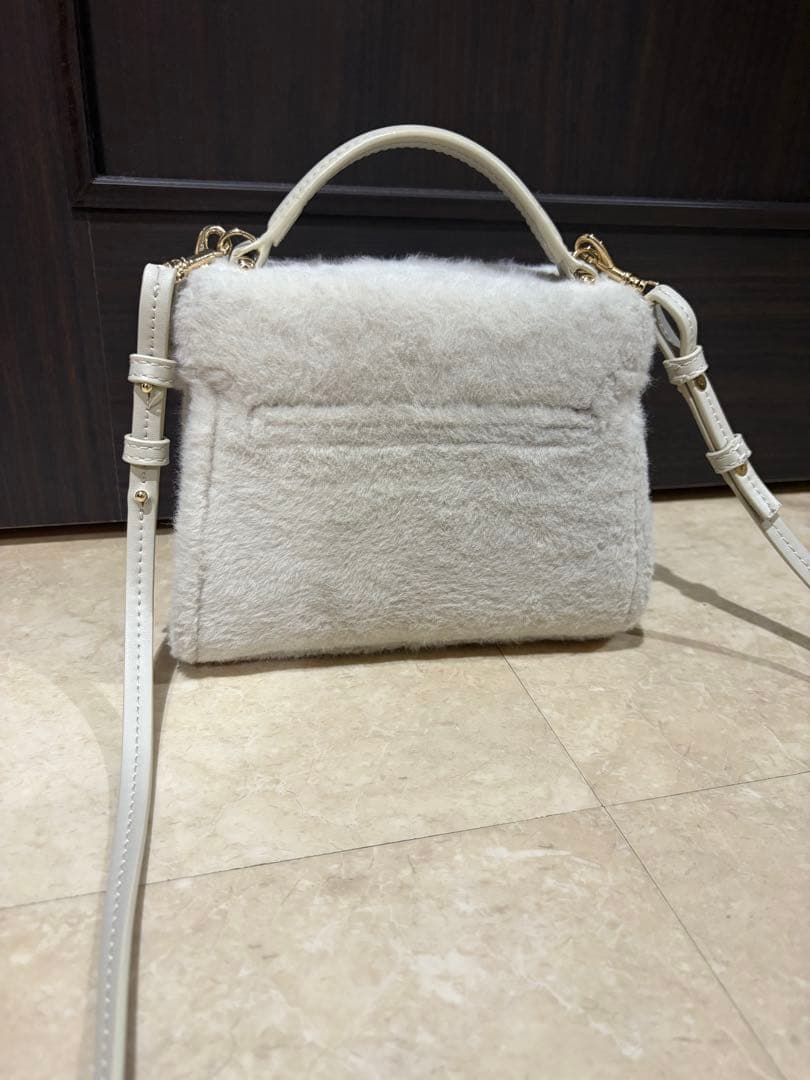 CELFORD 【リュタン】ビジュースタッズファーポシェット