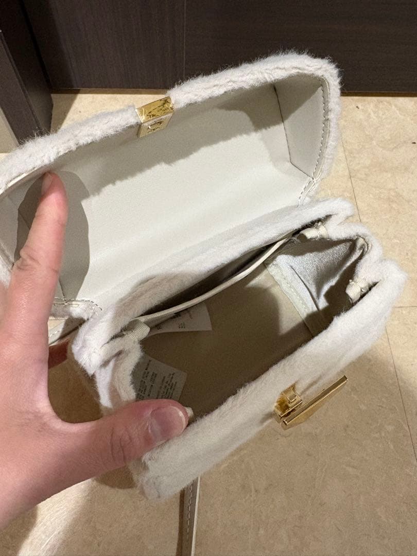 CELFORD 【リュタン】ビジュースタッズファーポシェット