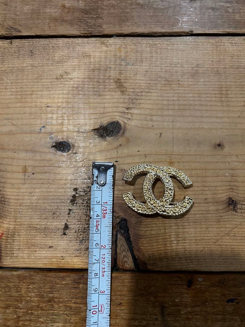 ビンテージ　CHANEL ロゴブローチ ゴールド