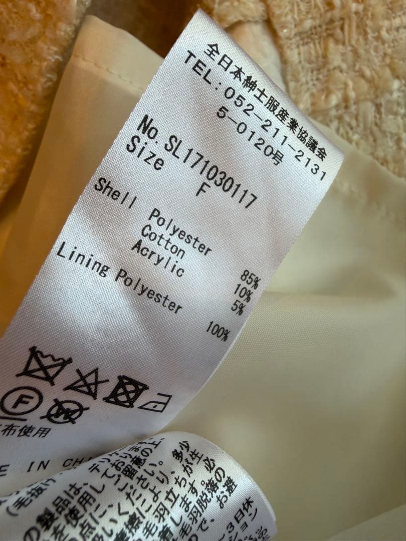 シェリエ shellerアイボリー ツイード ボタン付きミニワンピース