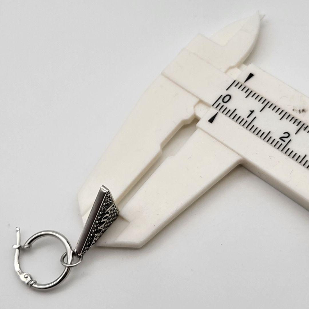 PRADA シルバー 三角形ピアス(片耳用) クリスタルロゴ ジュエル