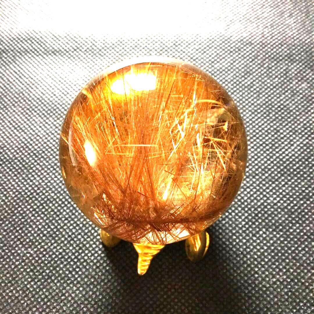 ゴールドルチルクォーツ置物　丸玉　ブラジル産　直経約4.83cm 重さ約160g