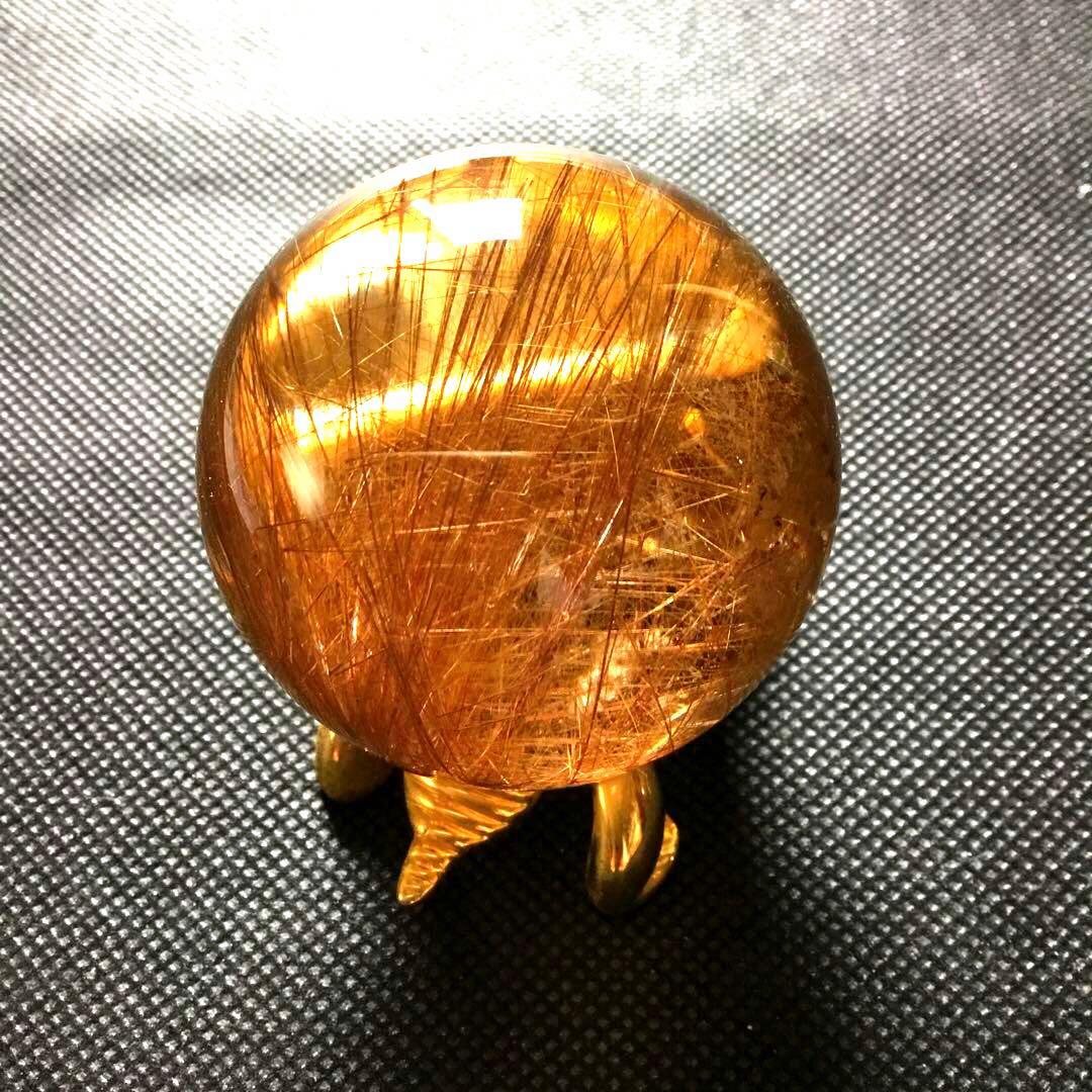 ゴールドルチルクォーツ置物　丸玉　ブラジル産　直経約4.83cm 重さ約160g