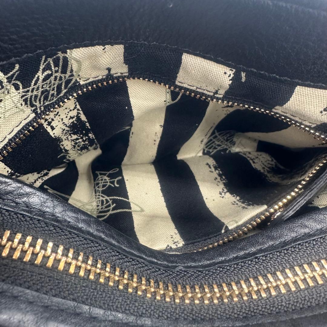 たま(=^_^=) Vivienne Westwood 黒レザー タッセル