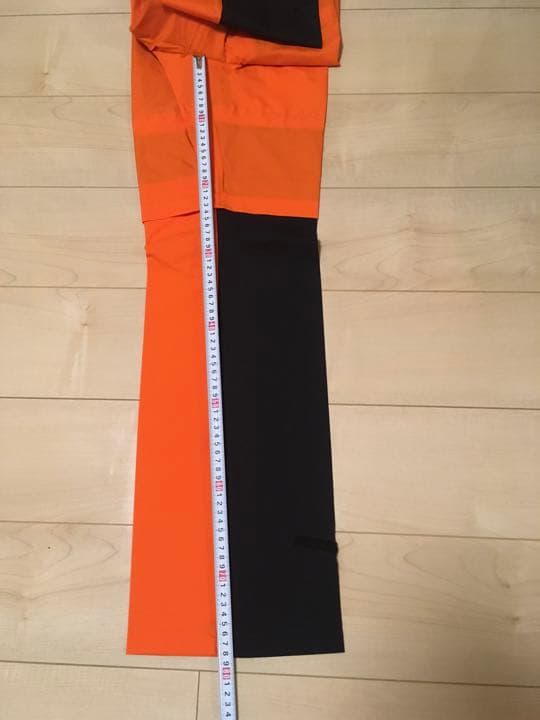 新品未使用　デサントのレインウェアセットアップ　オレンジ／黒　サイズO(TL)