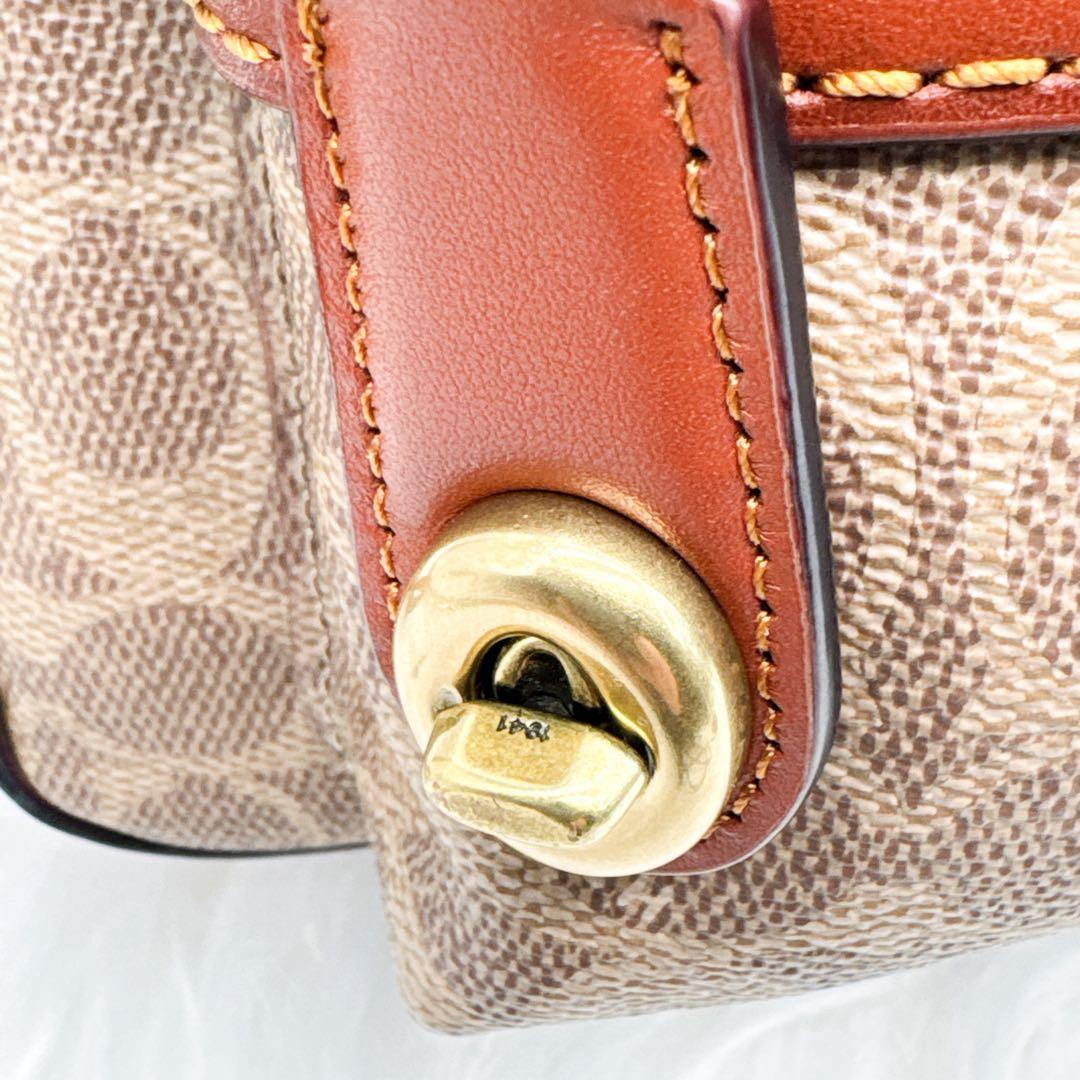 美品✨ COACH PVC レザー ターンロック シグネチャーミニリュック