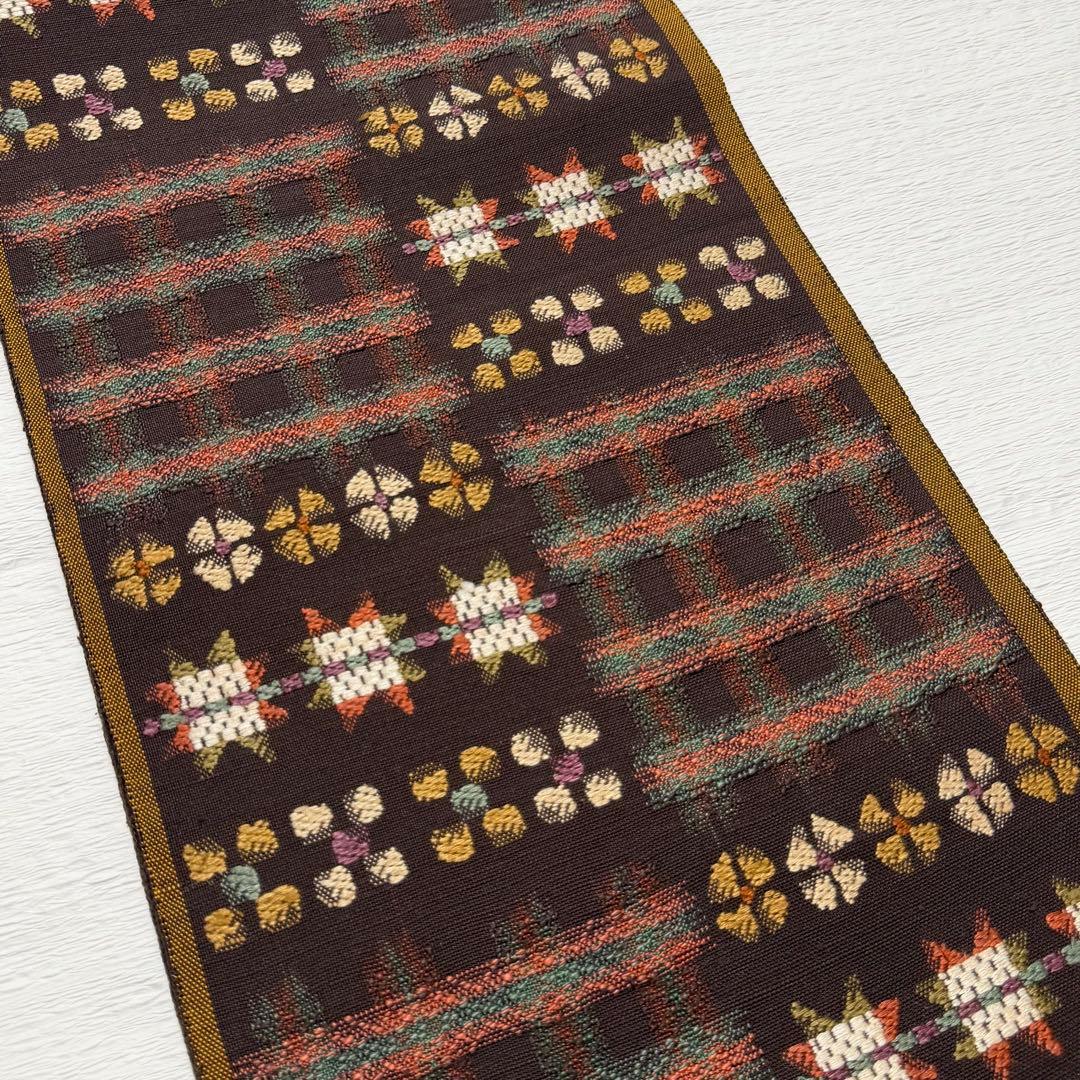 帯屋捨松 謹製 \"スウェーデン裂文\" 名古屋帯 正絹