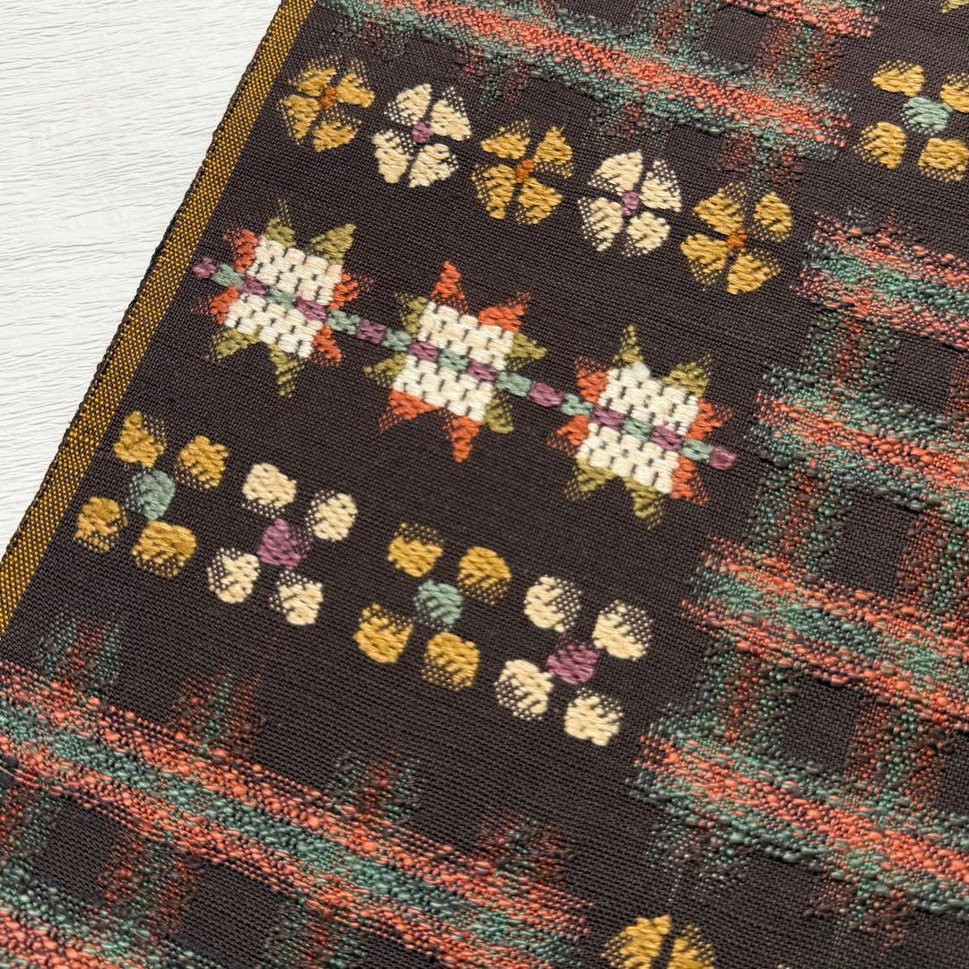 帯屋捨松 謹製 \"スウェーデン裂文\" 名古屋帯 正絹