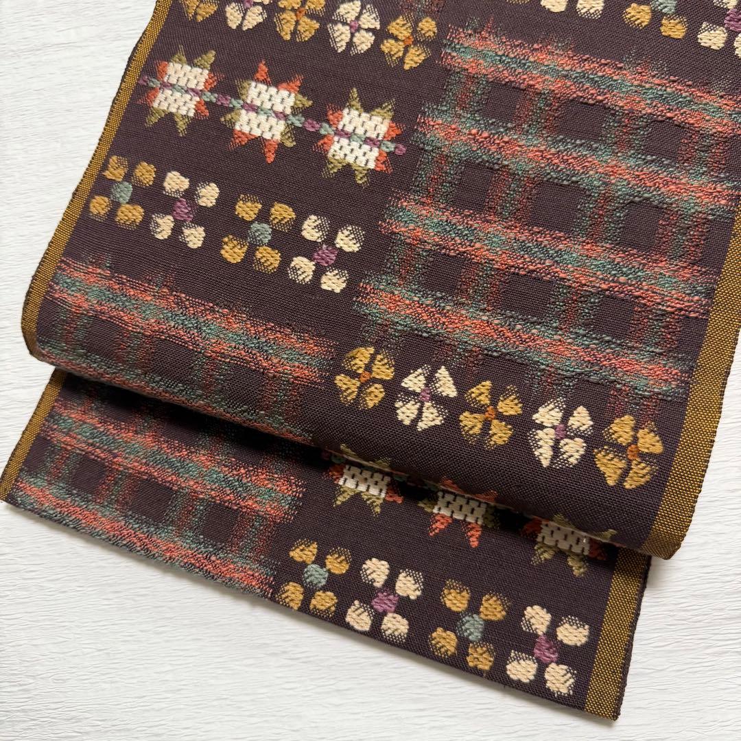 帯屋捨松 謹製 \"スウェーデン裂文\" 名古屋帯 正絹