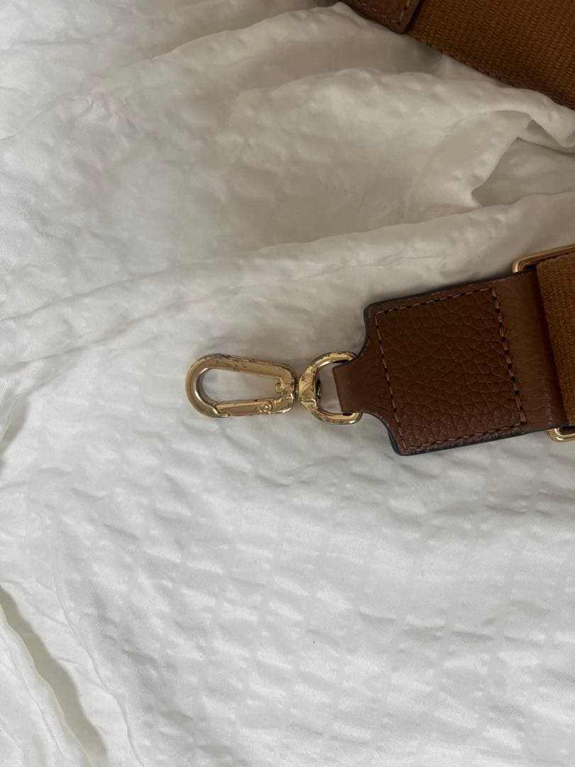 な*ぺ様 ブラウンレザー ハンドバッグ タッセル付き