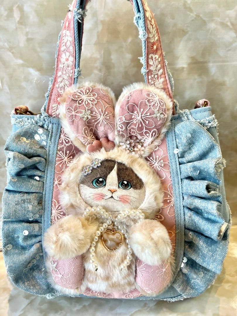 コヤンイサムチョン　ぽってり可愛い　ハートフリンジとフリルのデニムバッグ