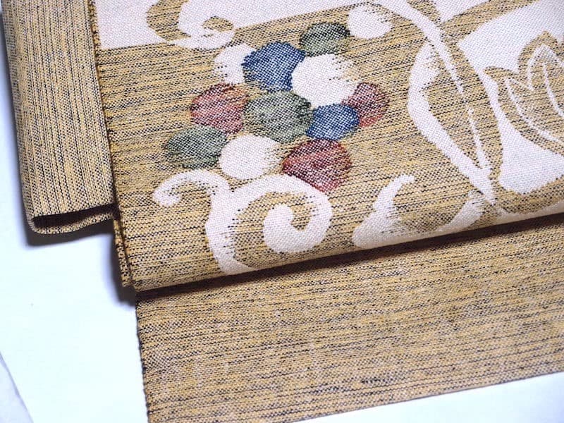 西陣織　紬八寸名古屋帯（市松に葡萄葉文）長366　三幸織物　正絹美品