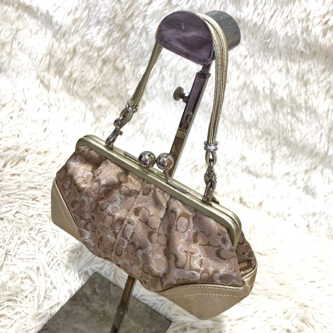 コーチ レザー ミニ ハンドバッグ シグネチャー キャンバス ガマ口