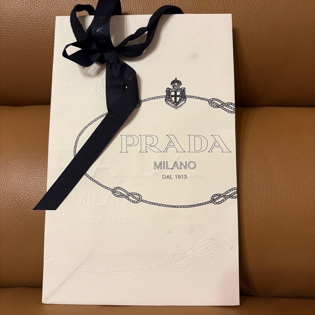 プラダ　iPhone13mini用カバー　水色　中古