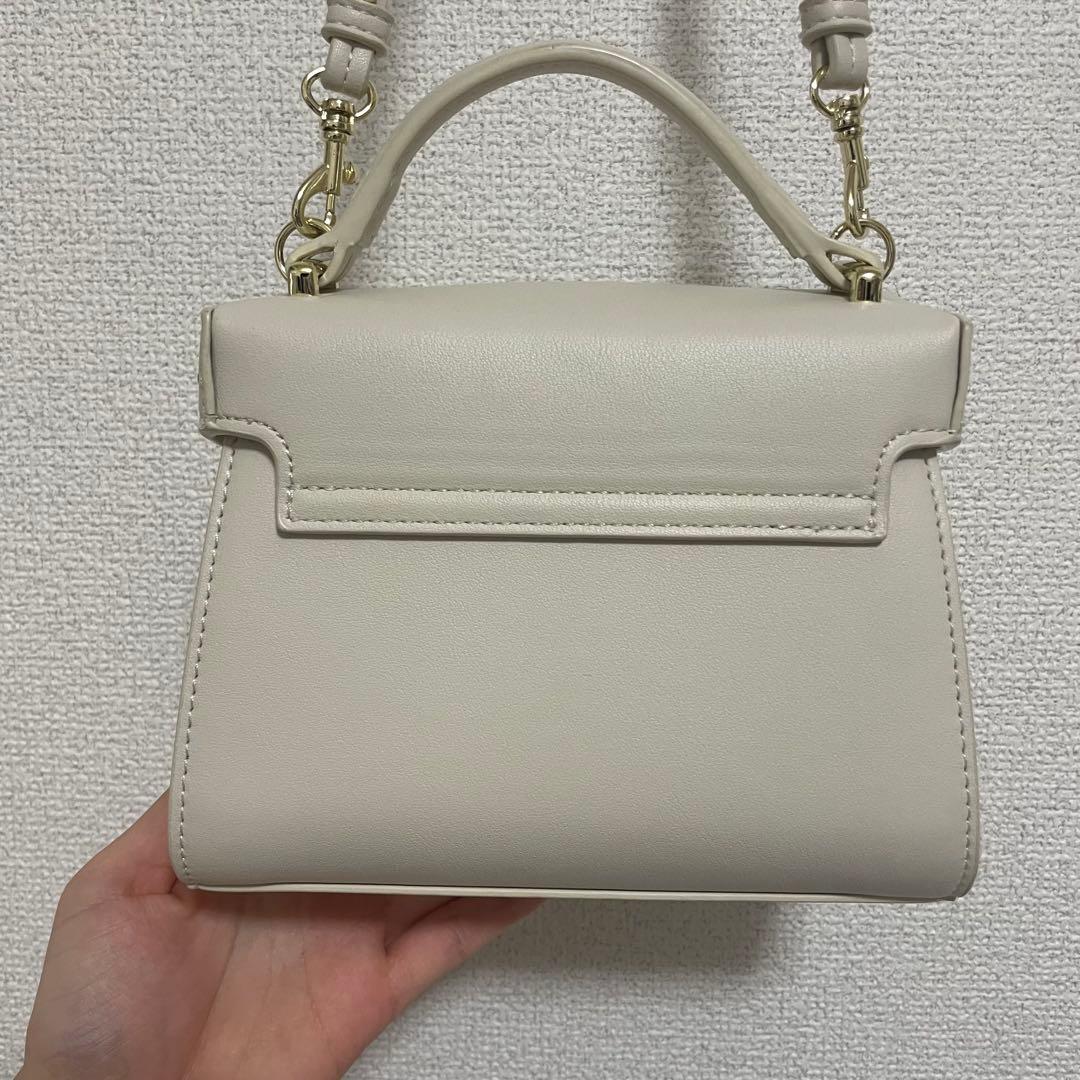 【リュタン】ビジュースタッズポシェット アイボリー